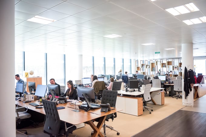 Sustaining SAP and Cloud Transformation: Why a modern Managed Service is required - image of open plan office