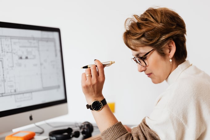 woman at a desk (3 SAP/Azure market place trends you need to know about blog)