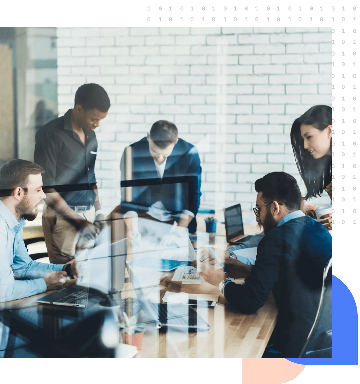 A group of employees working on a solution